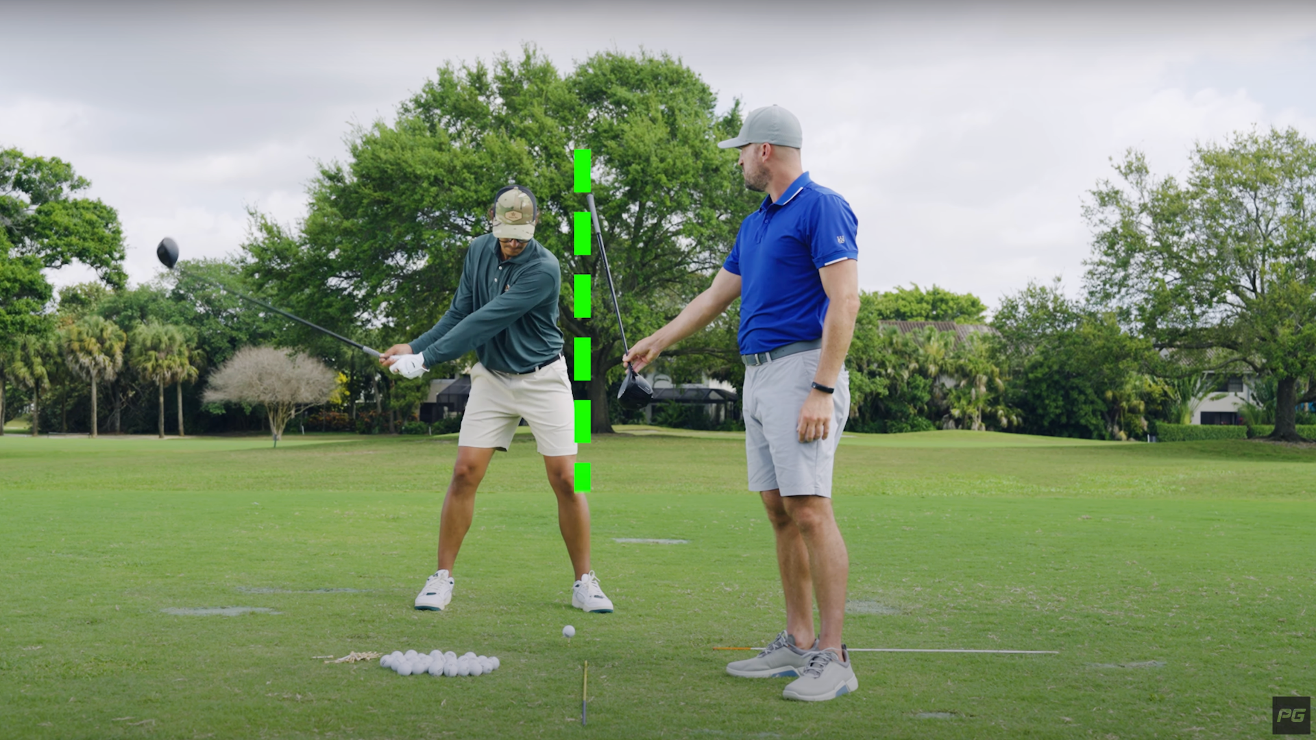 Pro golfer instructing how to get behind the ball