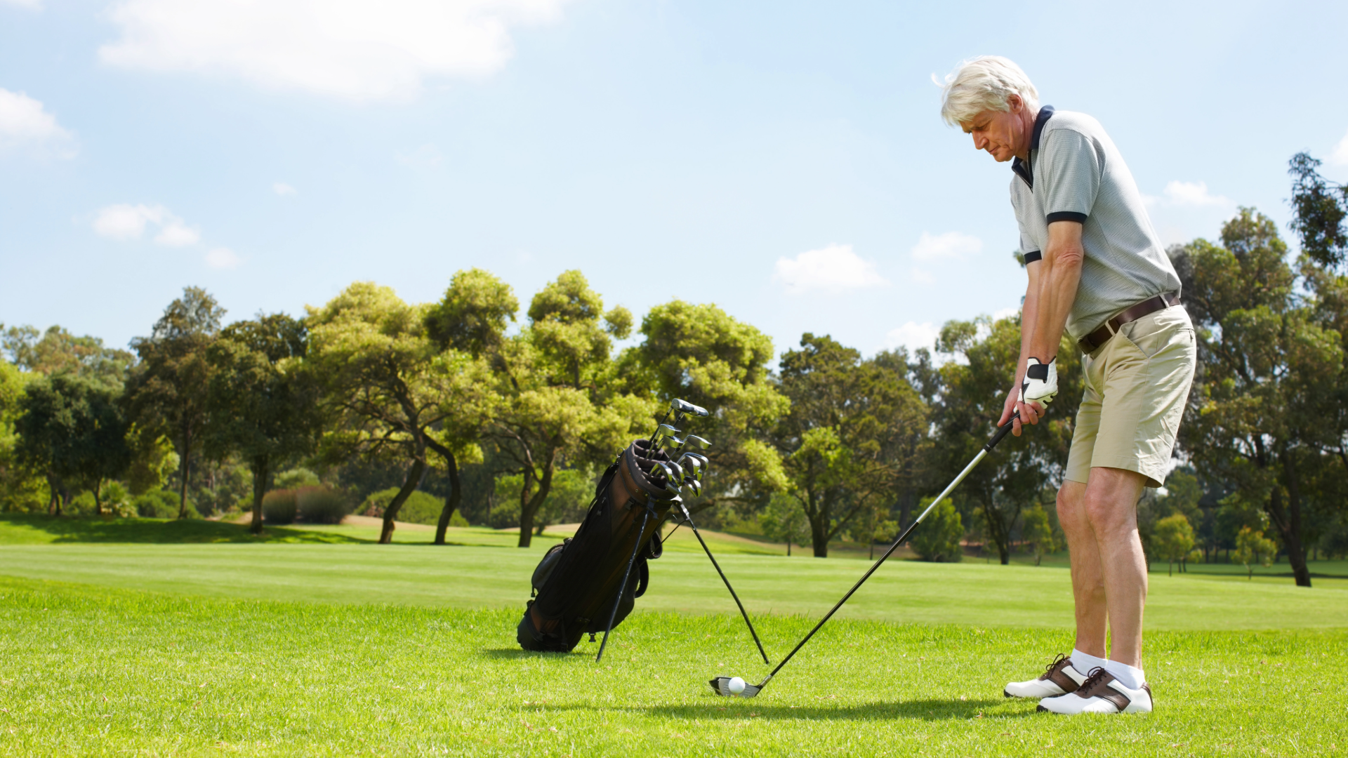 Golfer standing on a golf course